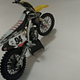 Illustration for article titled Two wheel Tuesday NewRays Carmichael and Roczens Suzuki RM-Z450s